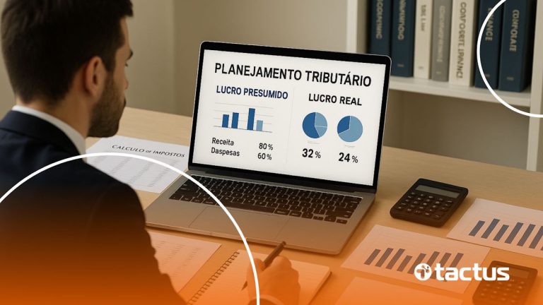 Imagem mostra contador no seu notebook analisando dois gráficos diferentes com lucro presumido x lucro real na tela