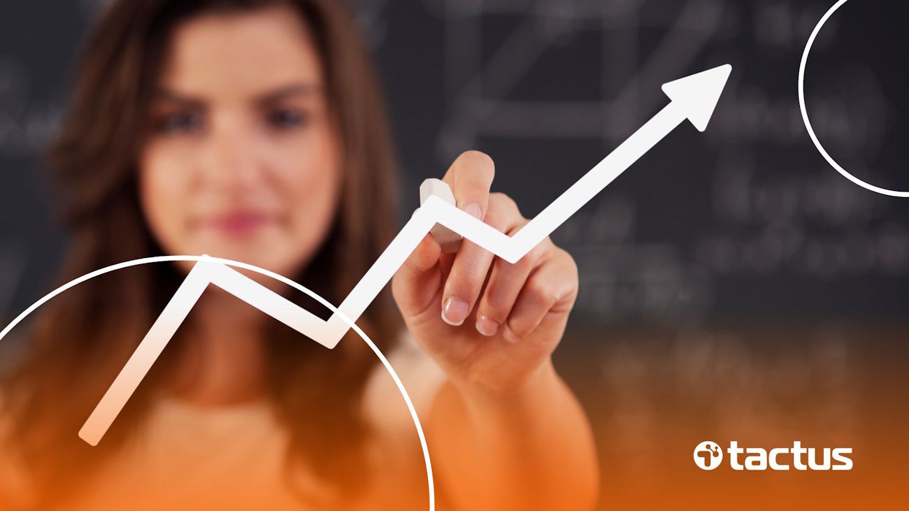 Imagem mostra mulher segurando seta para cima, para mostrar o aumento de tributação com a reforma tributária